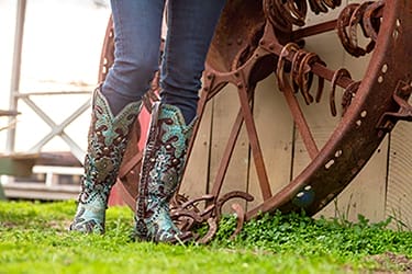 Turquoise Cowboy Boots Women - Lady Wearing Ammunition Boots